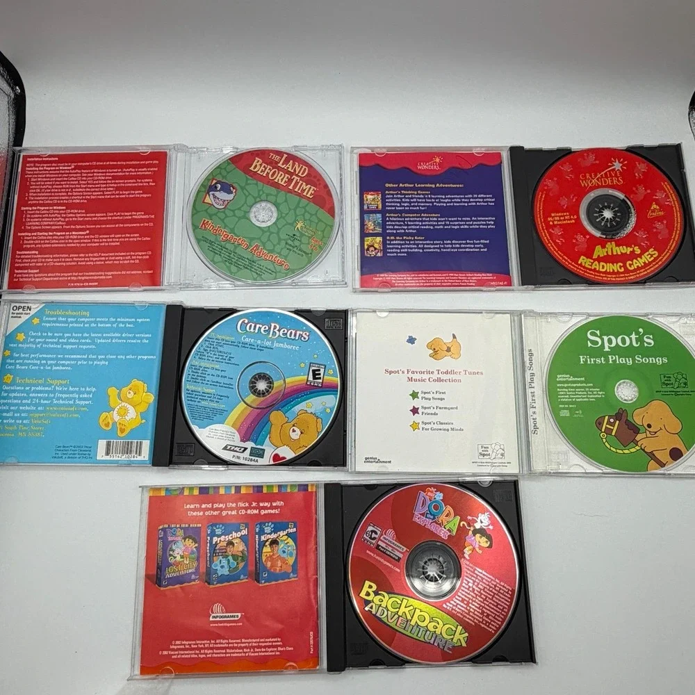 Kids CD ROM Game Lot Dora Care Bears Arthur Land Before Time Spot PC Mac
